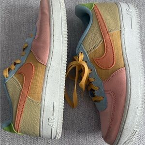 Nike Air Sneakers with Pink, Yellow, and Blue Accents